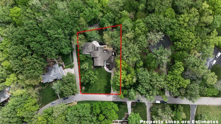 Aerial showing the property boundary across 1.22 acres