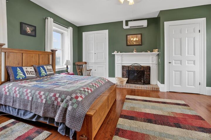 Primary bedroom with its own fireplace