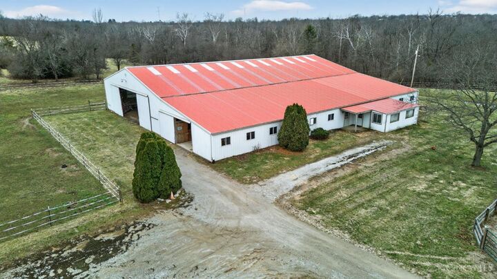 Aerial of the stable and arena complex with surrounding acreage